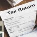 Your cash: Smaller tax refunds darken an already grim client debt image
